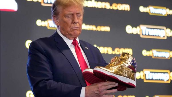 Trump Hawks $399 Branded Shoes at 'Sneaker Con,' a Day After a $355 Million Ruling Against Him 