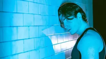 Former Boxer Kieron Moore Takes Bold Lead as Queer Camboy in “Blue Film
